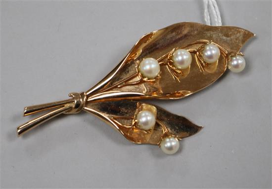 A 14ct gold and cultured pearl set foliate spray brooch, 8cm.